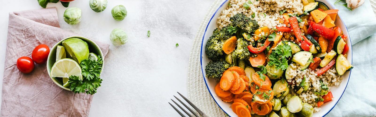 Colorful quinoa salad with fresh vegetables creates a healthy, balanced meal.